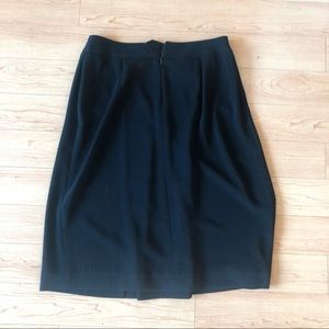 Regina porter pleated single pocket button and zipper skirt